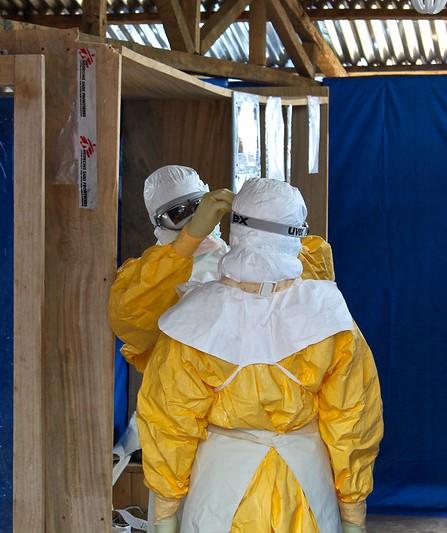 Two Ebola health workers wearing protective equipment
