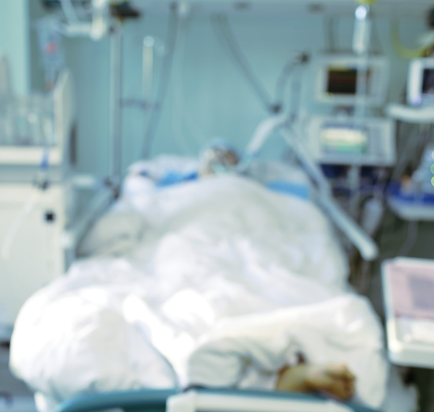 Blurred patient in hospital bed