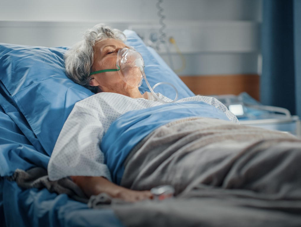 Older woman on hospital oxygen