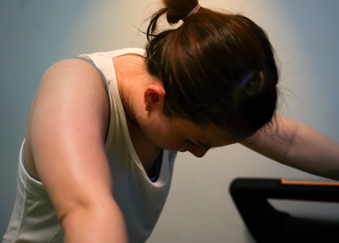 Tired woman on treadmill