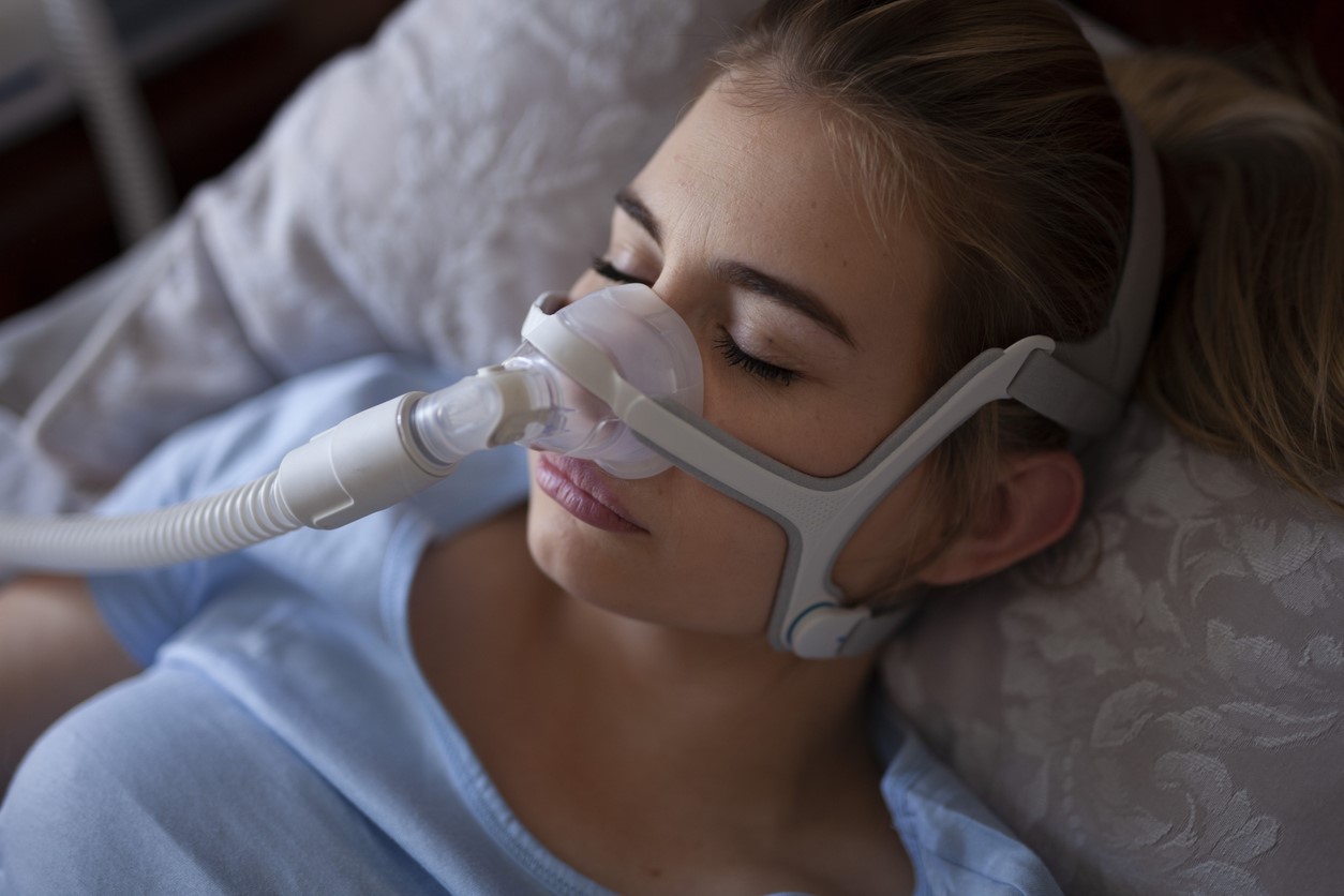 Woman using CPAP