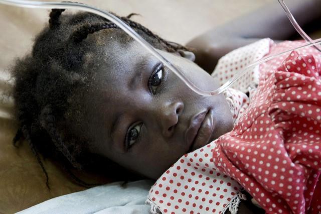 child getting cholera treatment