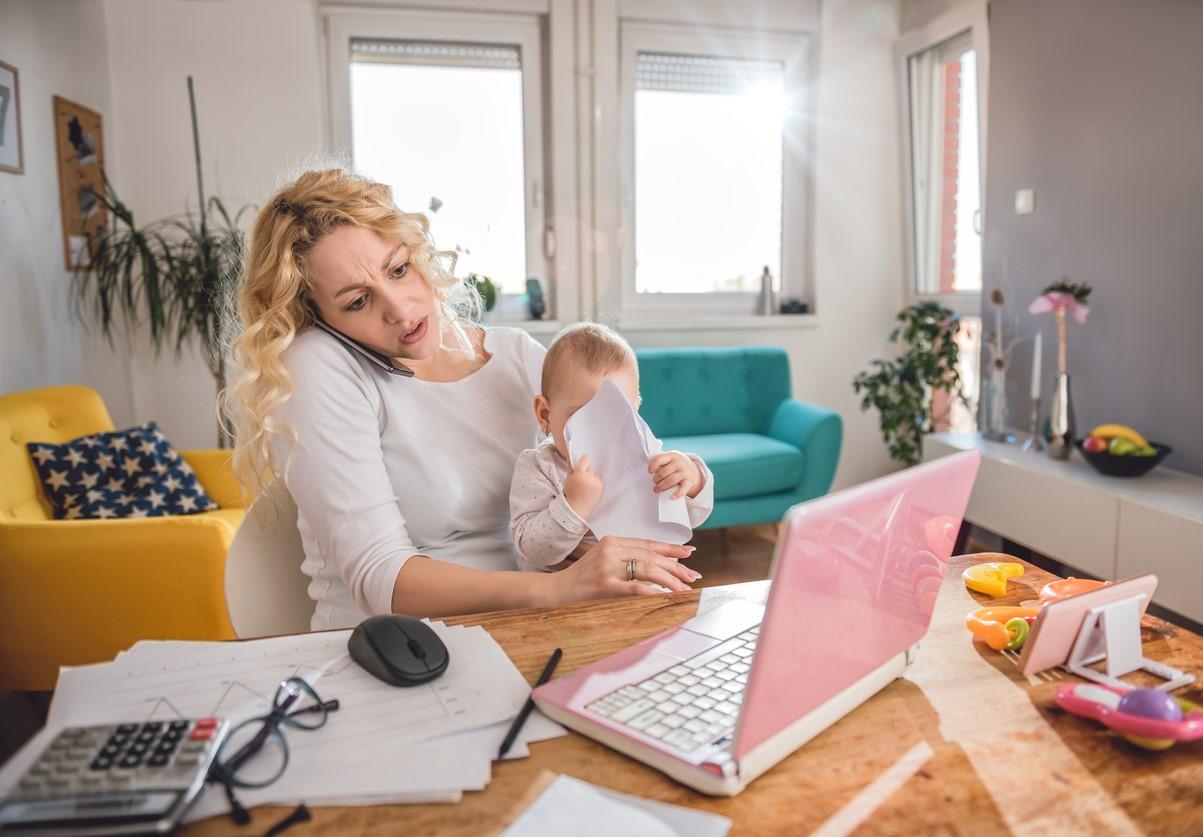 Stressed working mom with baby