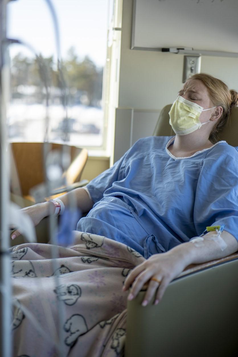 Woman in labor wearing mask