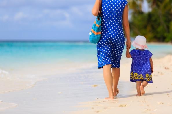 Mother and toddler on tropical beach
