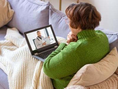 Older woman with telehealth consultation