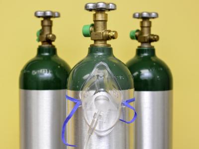 Three medical oxygen tanks
