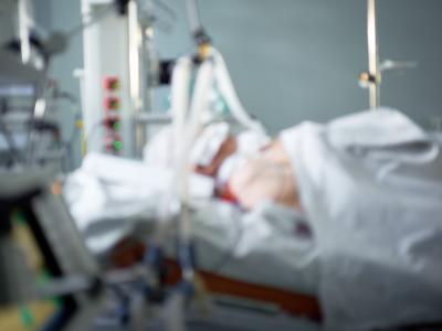 Patient in ICU bed