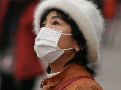 Chinese woman wearing mask