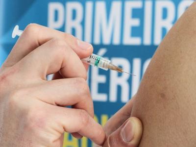 Dengue vaccine needle and arm