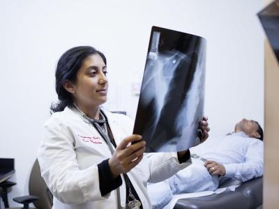 Doctor reading TB lung x-ray