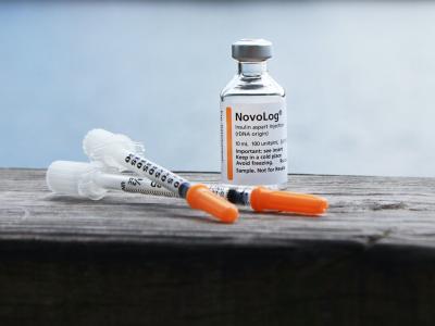 Insulin bottle and syringes