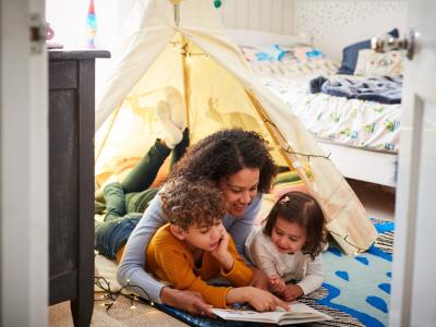 Mom with kids in bedroom tent