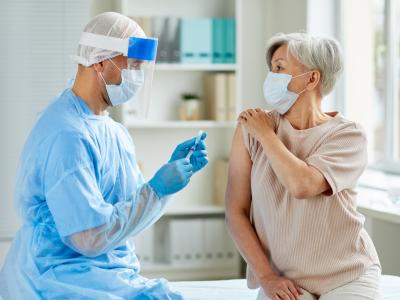 Nurse preparing to give vaccine