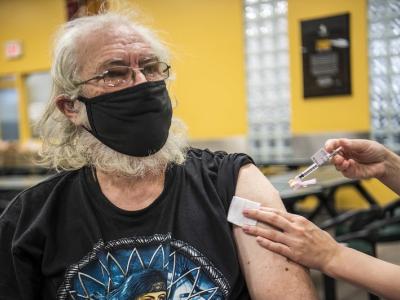Older man getting COVID vaccine