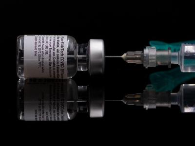 Pfizer COVID vaccine with syringe