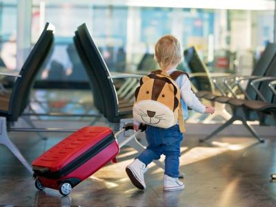 Small child walking in airport