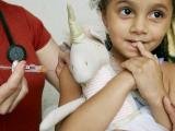 Girl getting vaccinated