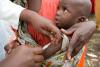 Child receiving measles vaccine